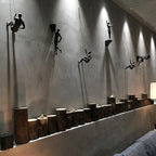 Climbing Figure Wall Sculpture